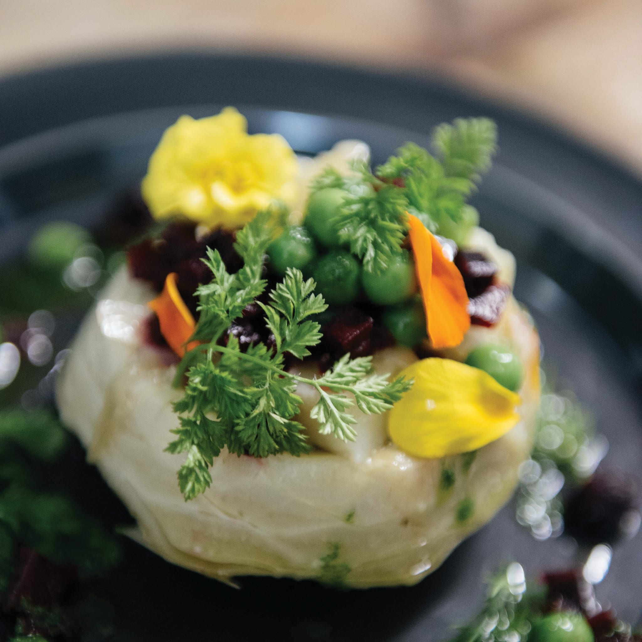 Artichoke Confit With Potatoes, Peas And Marinated Beets.