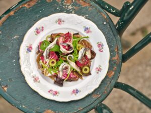 Eggplant salad with radicchio, anchovies and olives.