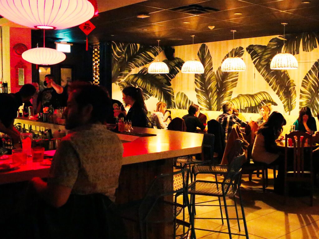 Hidden in a Chinatown basement behind a fake tailor shop, this oasis-like tiki bar serves Asian-themed tropical cocktails...