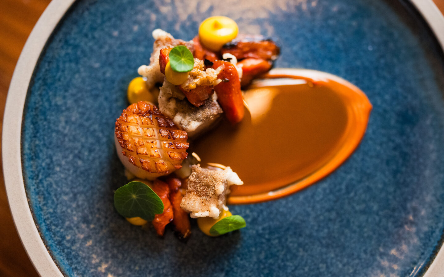 Scallop, pork belly, carrot, smoked clam vinaigrette.