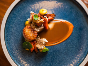 Scallop, pork belly, carrot, smoked clam vinaigrette.