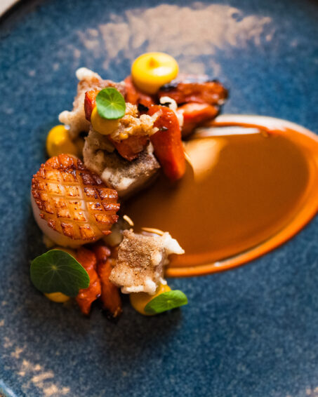 Scallop, pork belly, carrot, smoked clam vinaigrette.
