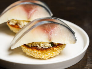Montadito of mackerel, sesame, horseradish.