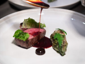 Beef rib, gem lettuce, black garlic, spiced jus.