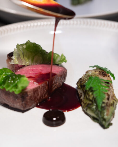 Beef rib, gem lettuce, black garlic, spiced jus.